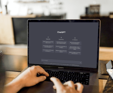 a person using chatGPT on their laptop